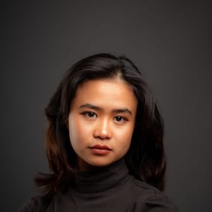 Portret van Lin Tan, Trainer en teamcoach